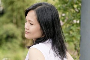 Nhung Bohman feeling reflective and hopeful after a hypnotherapy session, looking towards a brighter future